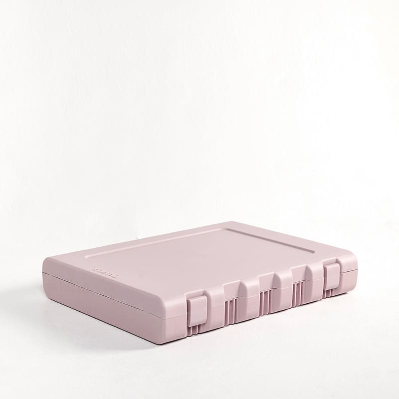 Pink medium-sized collapsible plastic dog crate by KindTail, designed for pets and shown folded for easy storage.
