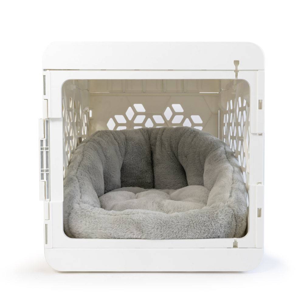 Light grey Calming Lounger dog bed by KindTail, featuring soft fabric and plush cushioning for comfort and relaxation.