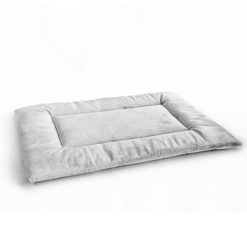 Light grey PAWD crate pad and dog bed by KindTail, soft cushioned surface for comfortable pet resting.