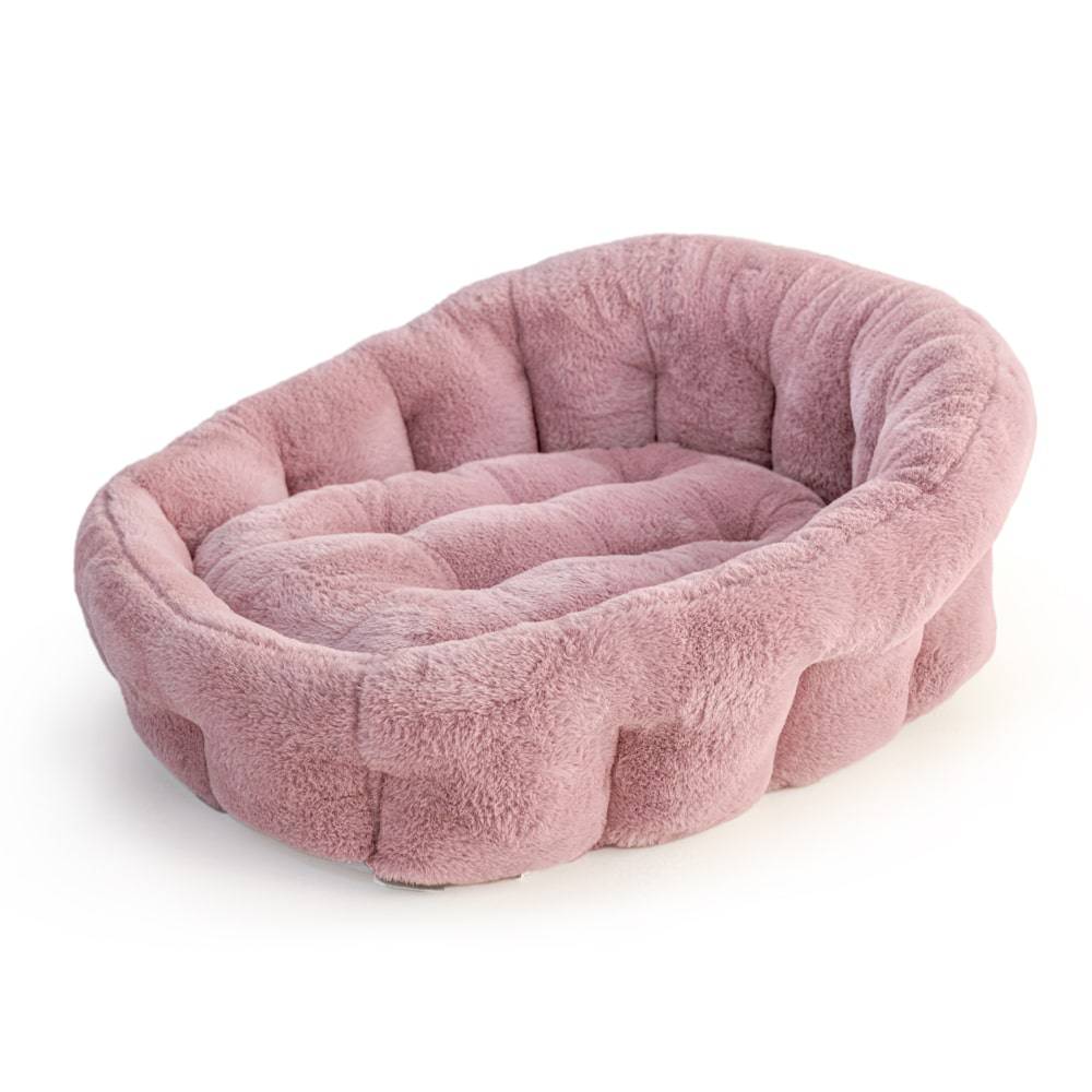 Pink Calming Lounger Dog Bed by KindTail, soft and cozy pet bed with cushioned sides for comfort and relaxation.