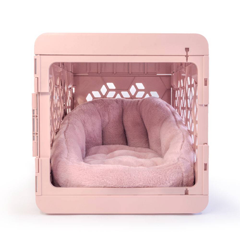 Pink calming lounger dog bed by KindTail, soft cushioned pet bed for comfort and relaxation.