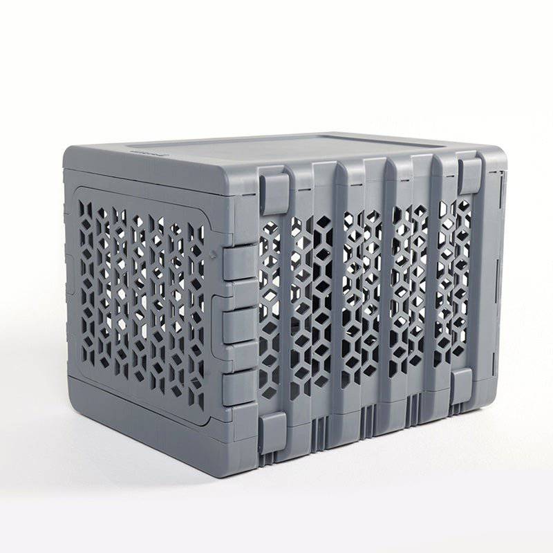 Modern collapsible plastic dog crate from PAWD® by KindTail, designed for small pets with ventilation and easy setup.