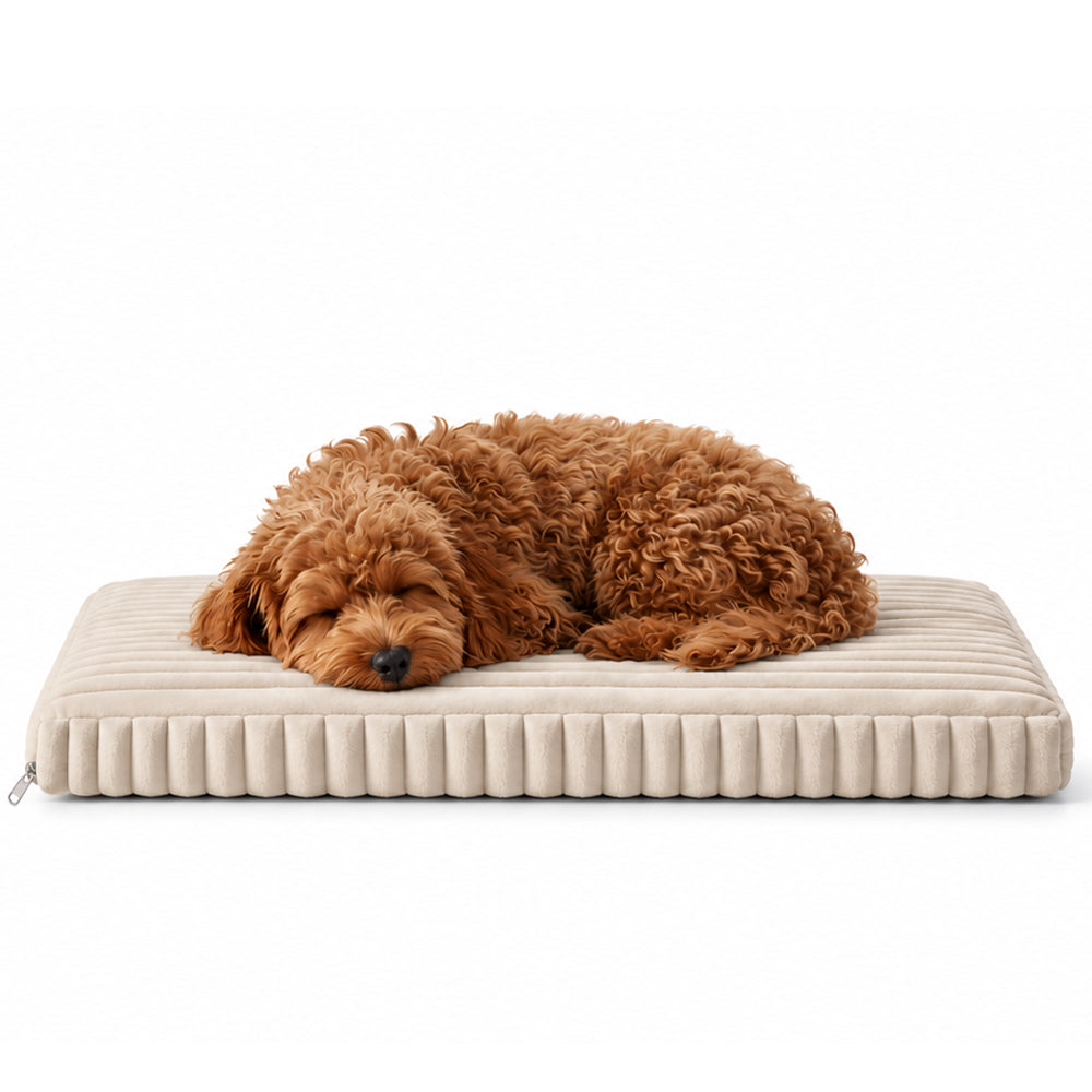Pink orthopedic crate pad and dog bed by KindTail providing comfort and support for dogs.
